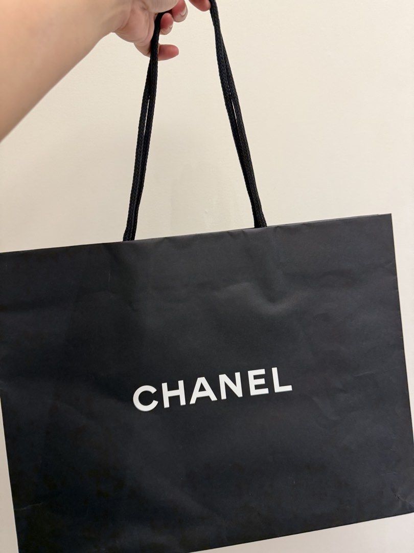 Chanel Paperbag (Category: Luxury Bags & Wallets) located in Taguig. Submitted by slay.ph (Listing ID 1425735522, Image 3). Description: 100% Original Chanel paperbag H 13” W 6.5”.
