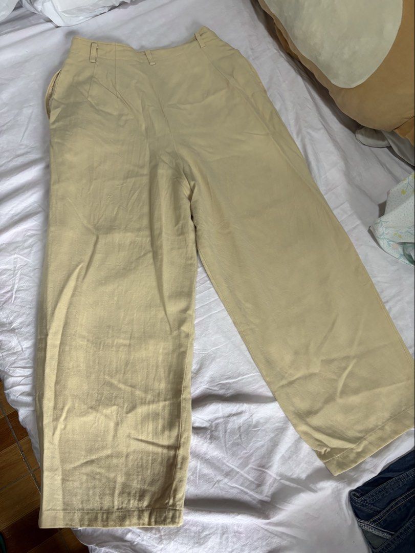 Claude Lema Beige Wide Leg Trousers (Category: Other Bottoms) located in Taguig. Submitted by amiwear (Listing ID 1445014012, Image 1). Description: - Beige wide leg trousers from Claude Lema - High waisted design - Zip and button closure - Pleated front detail - Made from a comfortable linen blend fabric - Versatile for casual or smart casual outfits Size: Small to Medium RFS: Declutterring Condition: 7/10 still in good condition Mode of Payment