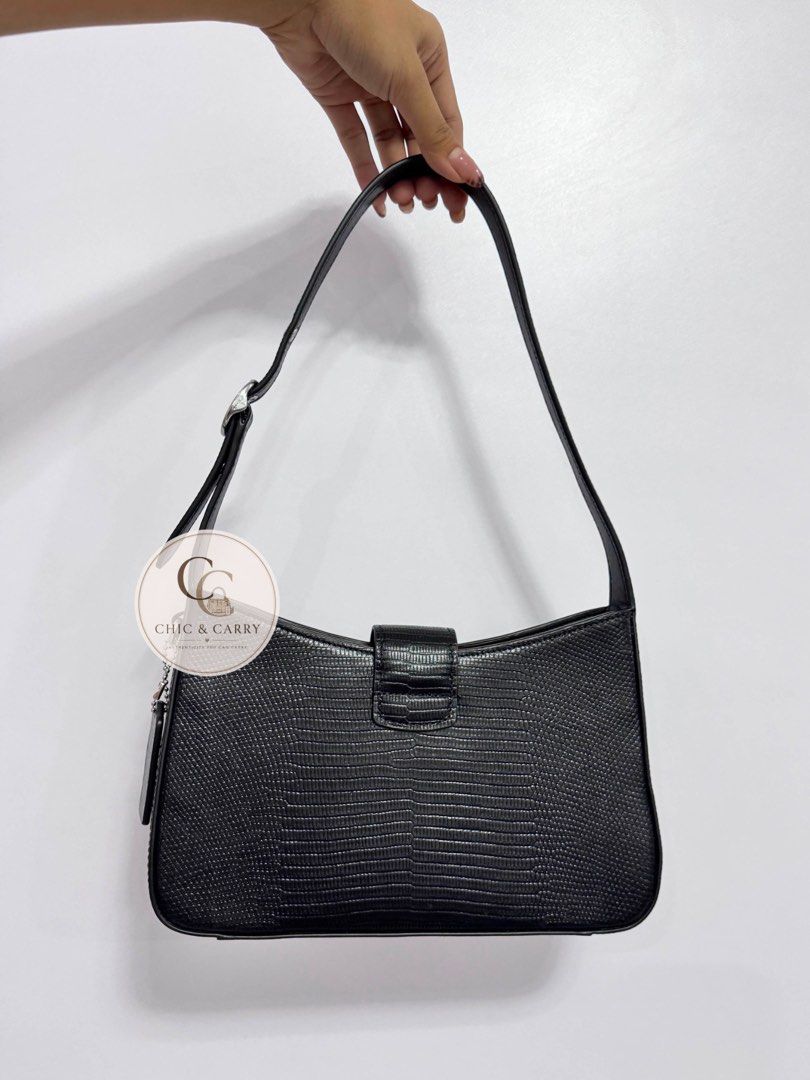 Coach Eliza Shoulder Bag - Black Lizard Embossed (Category: Luxury Bags & Wallets) located in Quezon City. Submitted by chicandcarry.ph (Listing ID 1445023254, Image 2). Description: ✨ Brand New 🤎 Inclusion: Care card 💌 PM for more photos and inquiries.
