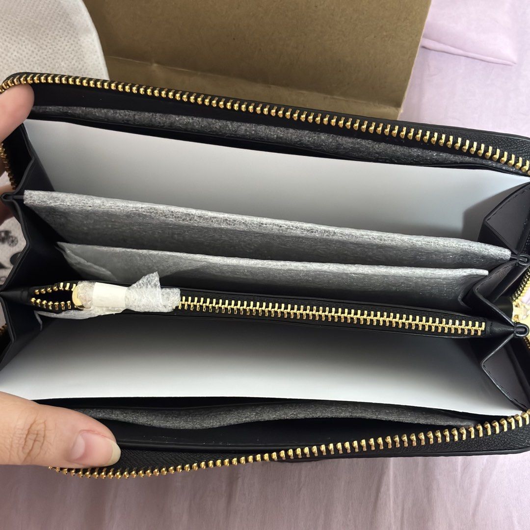COACH Long Zip Around Wallet (Category: Wallets & Card Holders) located in Manila. Submitted by rainefae (Listing ID 1444957669, Image 3). Description: COACH Long Zip Around Wallet More Info: COACH C4451 Pebbled Leather, Long Zip Around Wallet, IM/BLACK, 195031252280 💗 Personally bought in Coach store Singapore last June 2026. Original price on tag is 2,100 MYR and 675 SGD but bought it for 250 SGD (Around 11,750 Pesos). 100% Authentic and BRAND