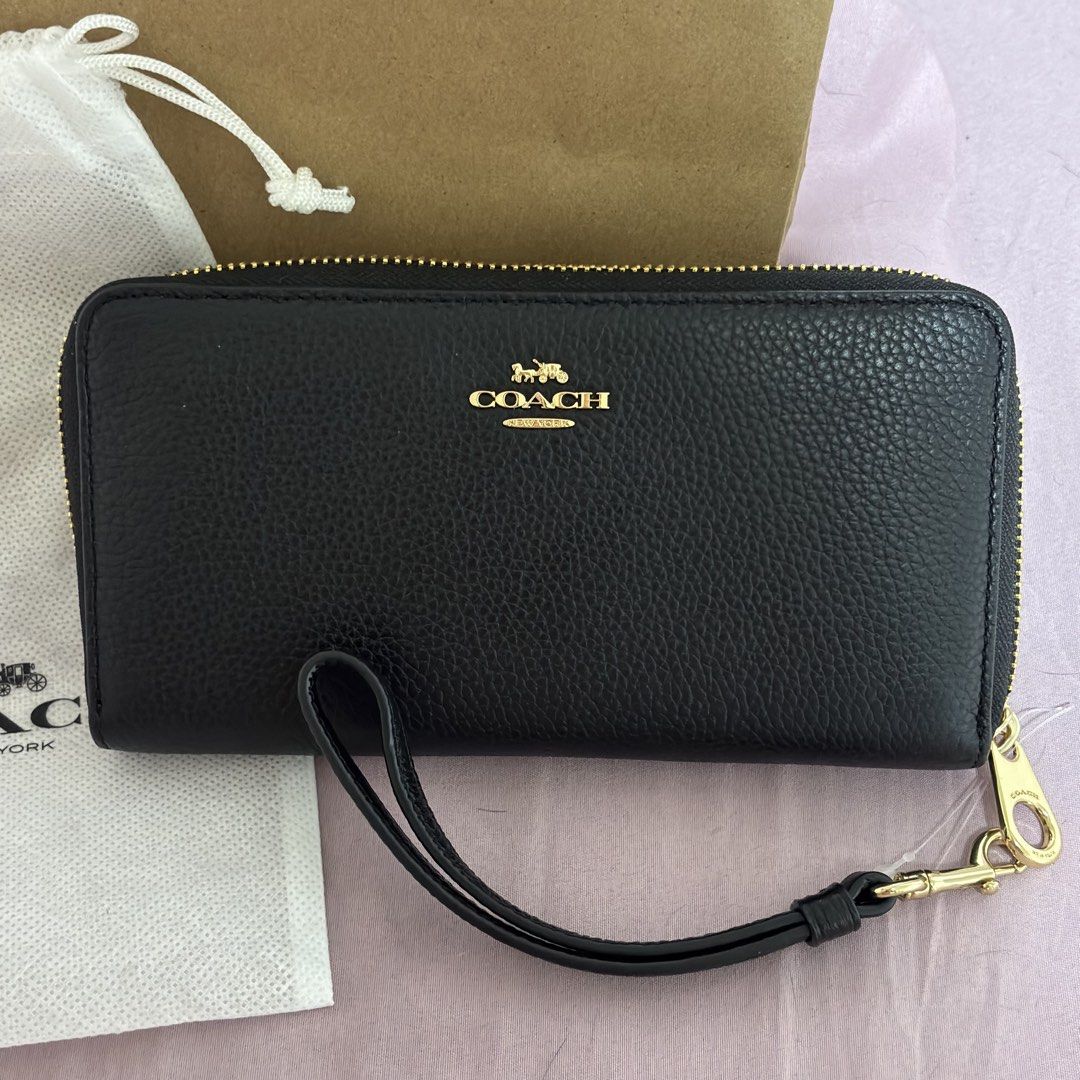 COACH Long Zip Around Wallet (Category: Wallets & Card Holders) located in Manila. Submitted by rainefae (Listing ID 1444957669, Image 2). Description: COACH Long Zip Around Wallet More Info: COACH C4451 Pebbled Leather, Long Zip Around Wallet, IM/BLACK, 195031252280 💗 Personally bought in Coach store Singapore last June 2026. Original price on tag is 2,100 MYR and 675 SGD but bought it for 250 SGD (Around 11,750 Pesos). 100% Authentic and BRAND