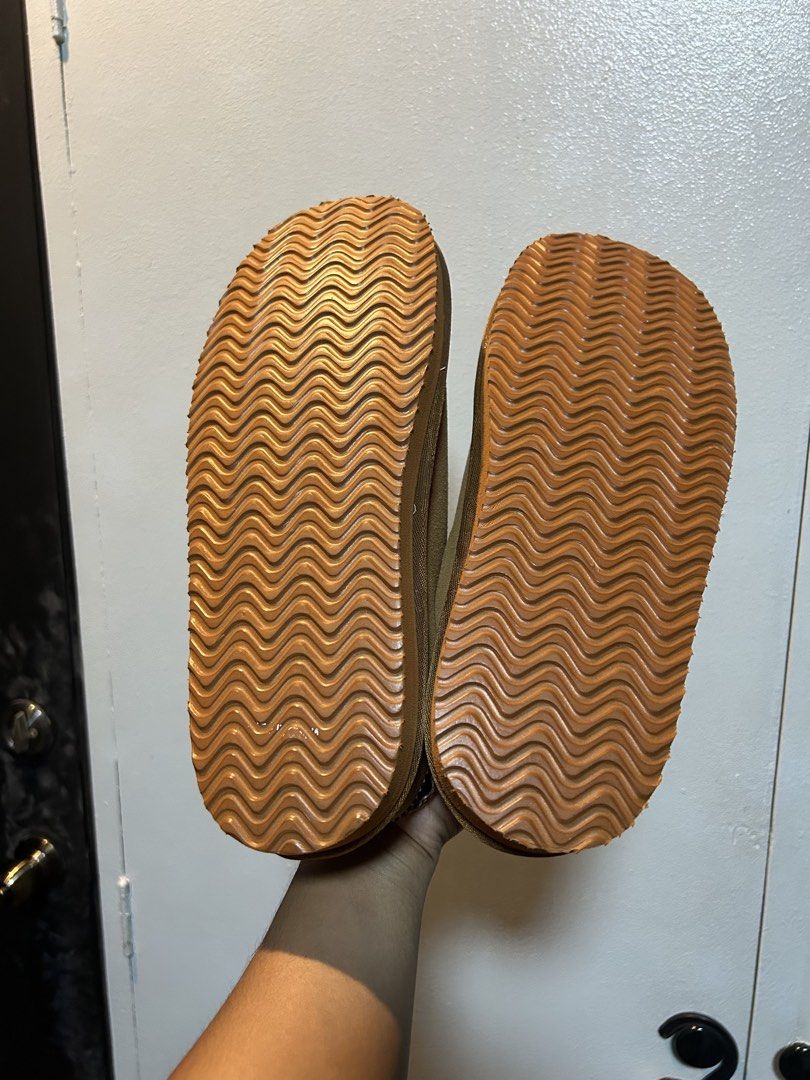 Cozy Brown Suede Slippers with Sherpa Lining (Category: Slippers & Slides) located in Manila. Submitted by popluxeph_ (Listing ID 1444940334, Image 3). Description: - Super comfy slippers perfect for lounging at home. - Brown suede exterior for a stylish look. - Warm and fluffy sherpa lining for ultimate comfort. - Sturdy, non-slip soles for safe indoor wear. - Decorative braided trim adds a nice touch. - Marked size 43..