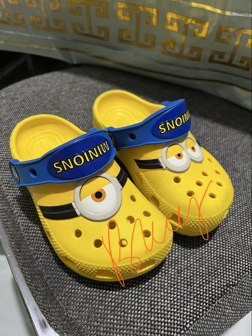 Crocs Minions size C9 unisex (Category: Babies & Kids Fashion) located in Mandaluyong City. Submitted by ms.bluey23 (Listing ID 1444949109, Image 3). Description: ✨ Authentic Crocs Kids Sandals/Clogs Fun and colorful Minions-themed Crocs perfect for everyday adventures! 🌟 Bright Yellow & Blue Colorway 🌟 Lightweight and Comfortable 🌟 Easy Slip-On Design with Heel Strap 🌟 Durable Croslite™ Material 🌟 Good used condition with normal signs of we