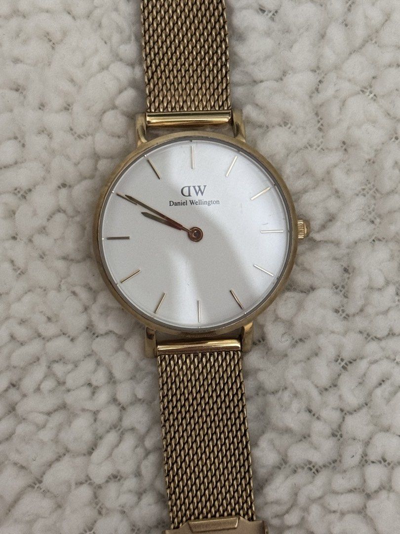 Daniel Wellington Petite DW Watch Gold Mesh Strap (Category: Women's Watches) located in Taytay. Submitted by kylalm (Listing ID 1444870730, Image 1). Description: - Authentic Daniel Wellington Petite DW Watch - Elegant Gold Mesh Strap - Classic White Face - Water Resistant up to 3ATM - Durable All Stainless Steel Construction - Reliable Japanese Movement - Serial Number: 04661791170 - CAN SHOW E RECEIPT bought from Z app.