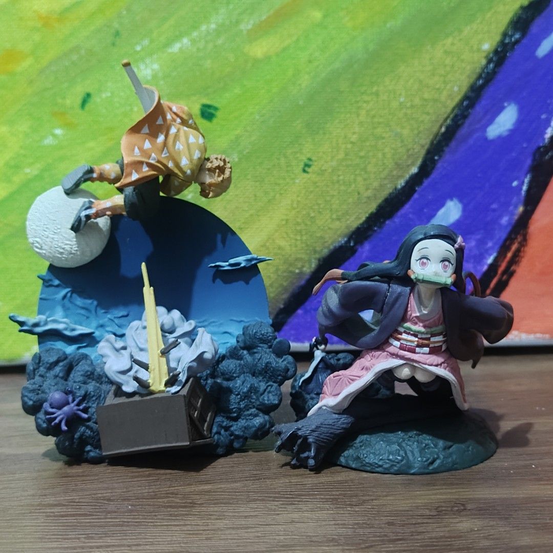 Demon Slayer Nezuko & Zenitsu Action Figures Set (Category: Figurines & Statues) located in Quezon City. Submitted by patric1218 (Listing ID 1445036090, Image 1). Description: - Set includes Nezuko Kamado and Zenitsu Agatsuma figures. - Highly detailed designs capturing iconic characters. - Each figure comes with a display base. - Ideal for fans of the Demon Slayer anime. - Perfect for decorating shelves or desks. - A must-have addition for any a
