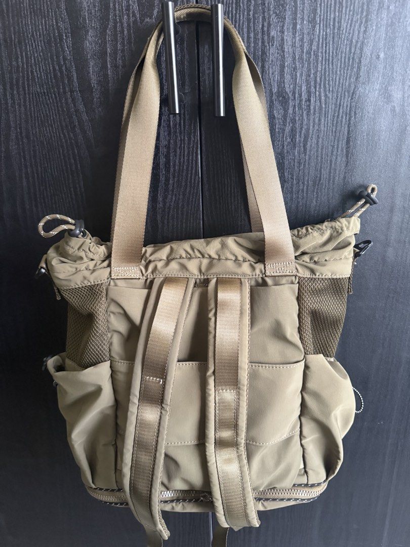 Desigual Khaki Nylon Tote Backpack 2way Bag (Category: Tote Bags) located in Mandaluyong City. Submitted by bookmarkdown (Listing ID 1445028424, Image 2). Description: - Bought for 6k+ - Barely used - Khaki green Desigual two-way bag - tote bag and backpack - Expandable (zippered below) - Durable nylon material - Multiple pockets inside and out for organization - Mesh details on the sides - Adjustable straps - Drawstring closure at the top - Idea