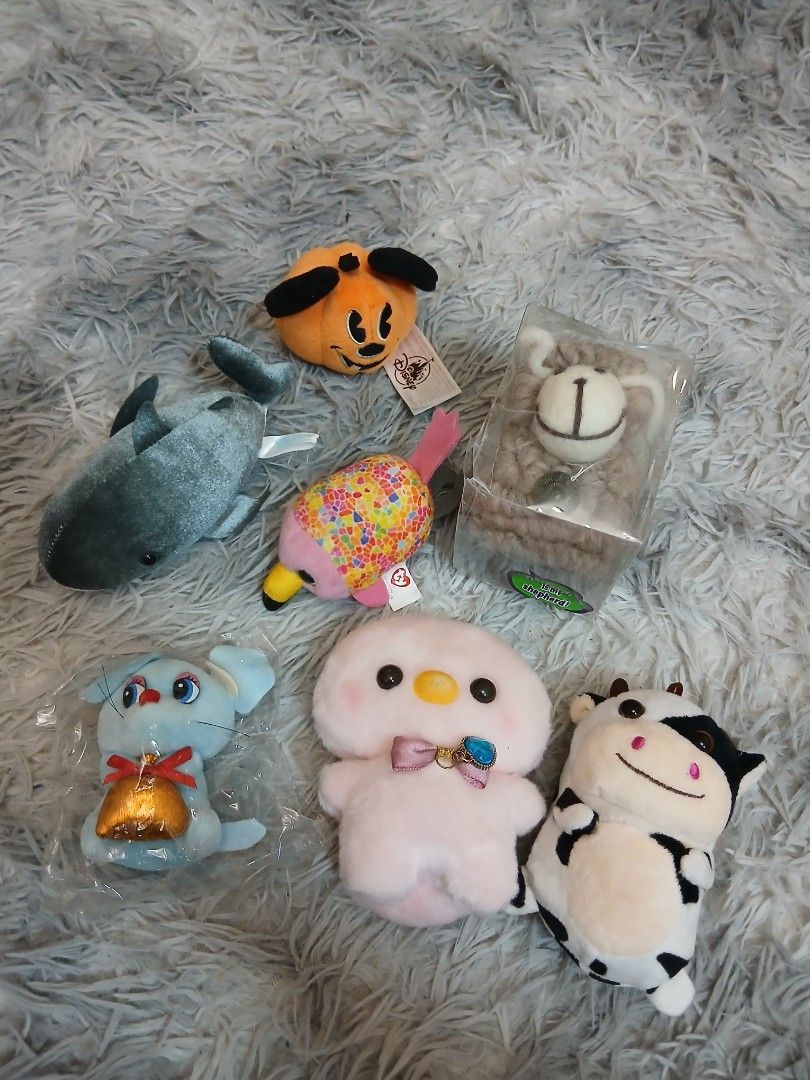 DISNEY TY Assorted Plush Toys (Category: Plushies & Soft Toys) located in Calamba. Submitted by thepinkpicksee (Listing ID 1444860950, Image 1). Description: - Bundle of 6 adorable plush toys - Includes: Halloween Mickey Mouse, colorful bird, cow, pink character, grey whale, and small dog - Some plush toys still have original tags attached - Ideal for plush toy collectors - Makes a wonderful gift for any occasion - Great value bundle deal for all