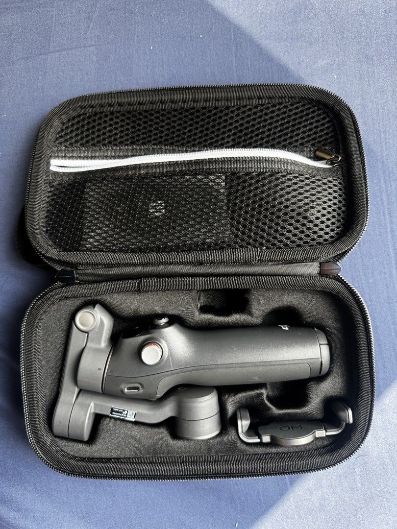 DJI OM 7/7P Gimbal Stabilizer with Accessories and Case (Category: Gimbals & Stabilizers ) located in Cagayan de Oro. Submitted by puretiger_38e27a (Listing ID 1444920535, Image 1). Description: - DJI OSMO MOBILE 7P gimbal stabilizer - Includes phone clamp - Comes with charging cable - Hard case for storage and transport - Ideal for achieving smooth video footage.