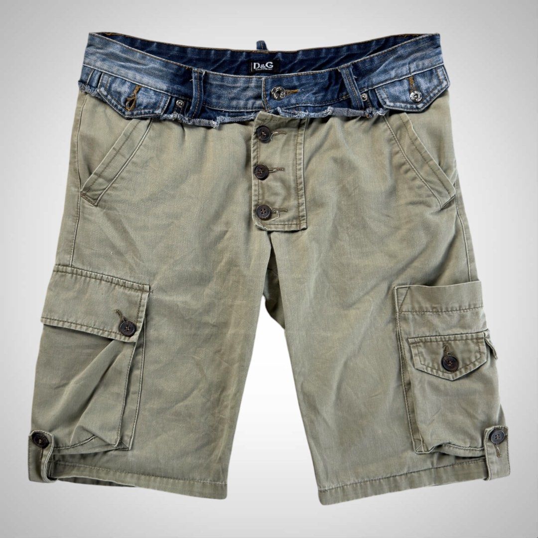 Dolce & Gabbana 2004 Hybrid Cargo Shorts (Category: Activewear) located in Zamboanga. Submitted by the.angura.store (Listing ID 1444922892, Image 1). Description: Dolce & Gabbana Hybrid Cargo Shorts Prepare to be dazzled by an exceptionally rare find: a pair of cargo green shorts from the prestigious fashion house D&G, adorned with a double denim waist. This extraordinary piece is a testament to D&G’s commitment to innovation and luxury, making i