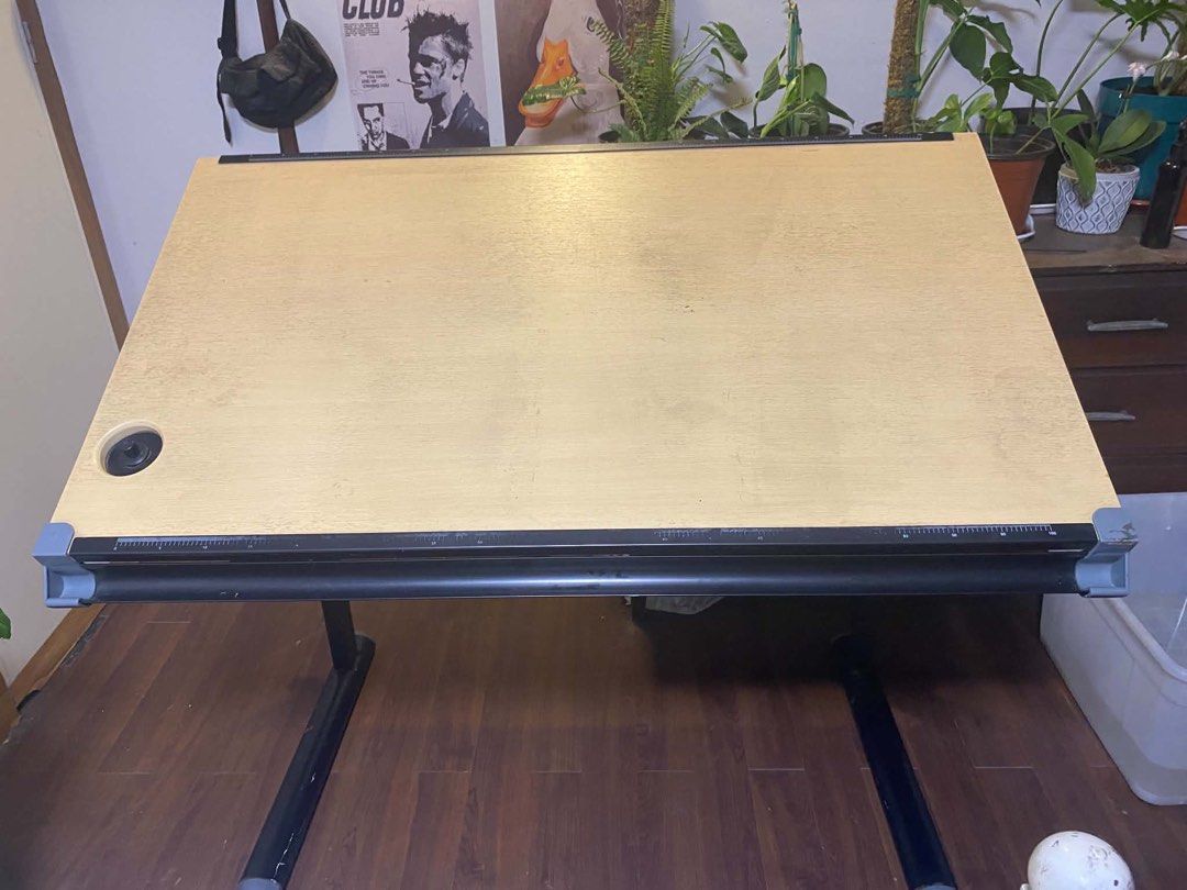 Drafting Table (Category: Office Furniture & Fixtures) located in Angeles City. Submitted by teysdeclutter (Listing ID 1444988501, Image 2). Description: ❗️FOR SALE: DRAFTING TABLE ❗️ 📍Location: Porac, Pampanga - Still in good condition - RFS: Di na po nagagamit for drafting - Adjustable height & tilting top - Negotiable price! 📩 PM if interested Note: shipping fee will be shouldered by buyer.