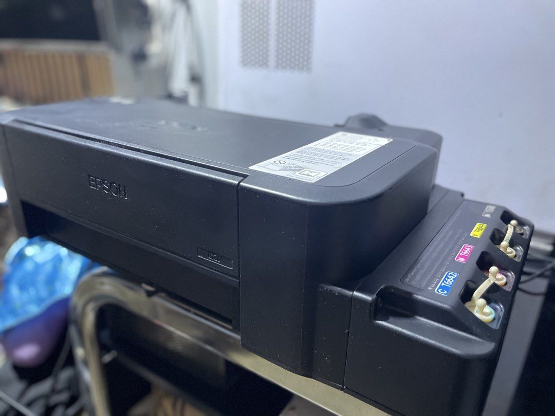 EPSON L120 NO SCANNER (Category: Printers, Scanners & Copiers) located in Manila. Submitted by designerbr74373 (Listing ID 1444981837, Image 1). Description: EPSON L120 No Scanner No issue at all Usb & Power Cord included No Box Las Pinas Location.