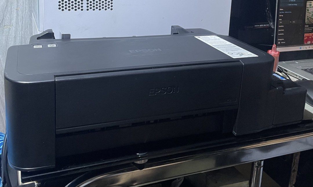 EPSON L120 NO SCANNER (Category: Printers, Scanners & Copiers) located in Manila. Submitted by designerbr74373 (Listing ID 1444981837, Image 3). Description: EPSON L120 No Scanner No issue at all Usb & Power Cord included No Box Las Pinas Location.
