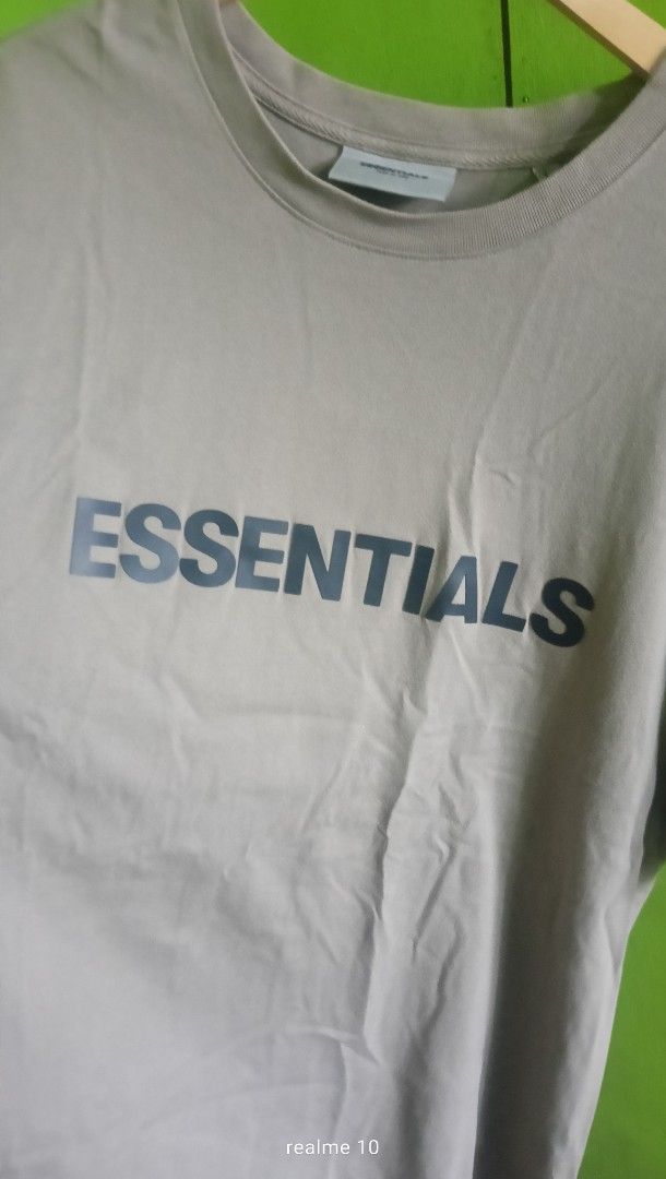 Fear of God Essentials T-Shirt Size L (Category: Tshirts & Polo Shirts ) located in Manila. Submitted by frostindustry888 (Listing ID 1445023802, Image 1). Description: - Grey Fear of God Essentials T-shirt - Classic Essentials logo printed on the front - Rubberized logo patch on the chest - Made from 100% cotton this is not a trift original bought from the the official website - Tagged size L - Ideal for everyday wear .