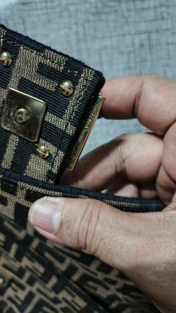 Fendi Baguette Monogram Canvas Shoulder Bag (Category: Luxury Bags & Wallets) located in Makati City. Submitted by macdwyneki84361 (Listing ID 1444968833, Image 3). Description: - Authentic Fendi Baguette Bag - Classic Zucca Monogram Canvas - Gold Hardware with Fendi Logo - Interior "Made in Italy" and "Baguette" Labels - Visible Serial Number Inside - Adjustable Strap - Ideal for Everyday Use.