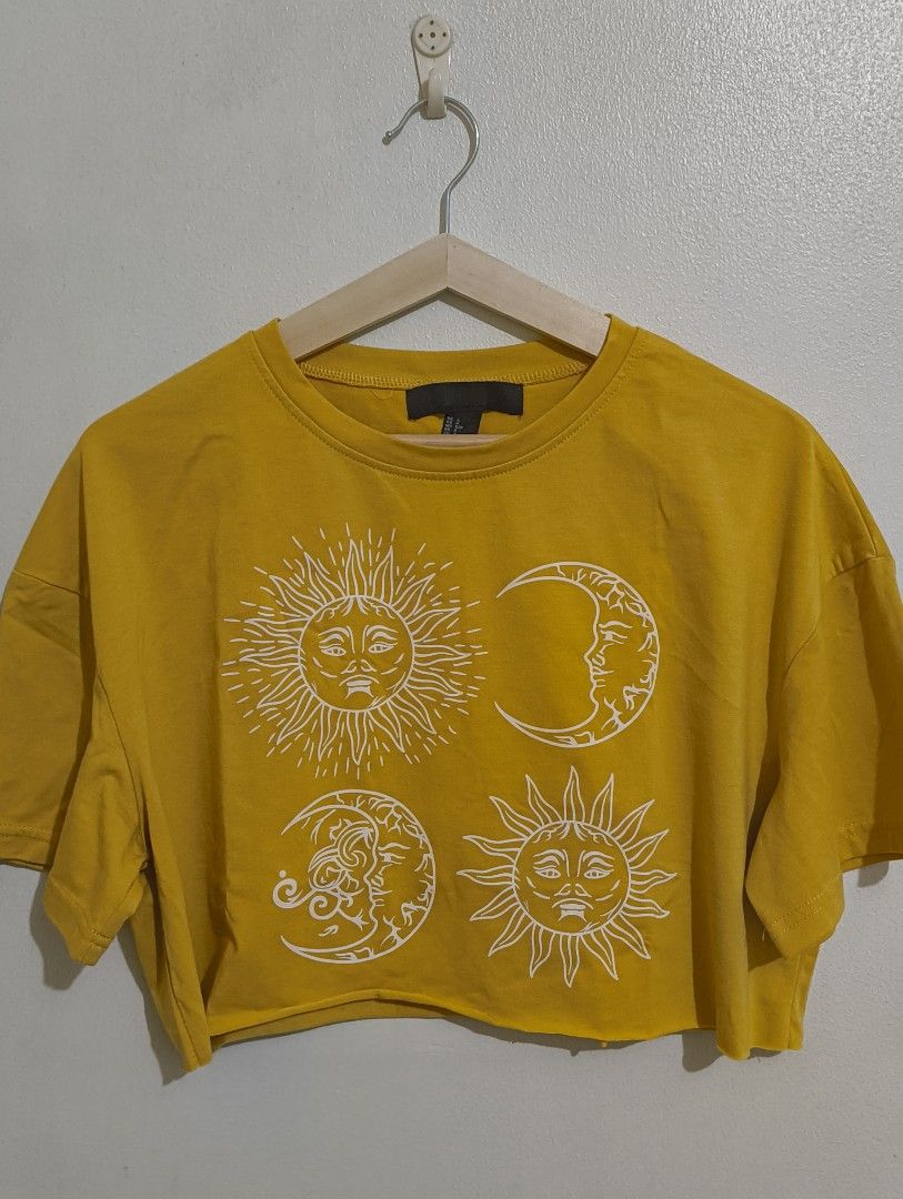 Forever 21 Celestial Yellow Crop Top (Category: Shirts) located in Quezon City. Submitted by afteruse (Listing ID 1445029676, Image 1). Description: Bought from Surplus Shop, obviously from the tag this is an F21 overrun. Fits medium to semi-large even if it says S on the tag!.