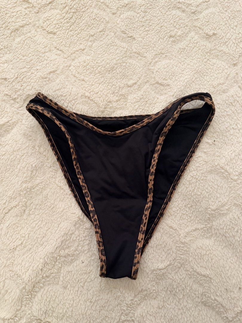 Frankies Bikinis x Bella Hadid Bikini Bottom (Category: Bikinis & Swimsuits) located in Quezon City. Submitted by tini__w (Listing ID 1444958209, Image 2). Description: - Cute black bikini bottoms - Features fun leopard print trim along the edges - High-cut style - Small on tag but runs small, best fits XS.