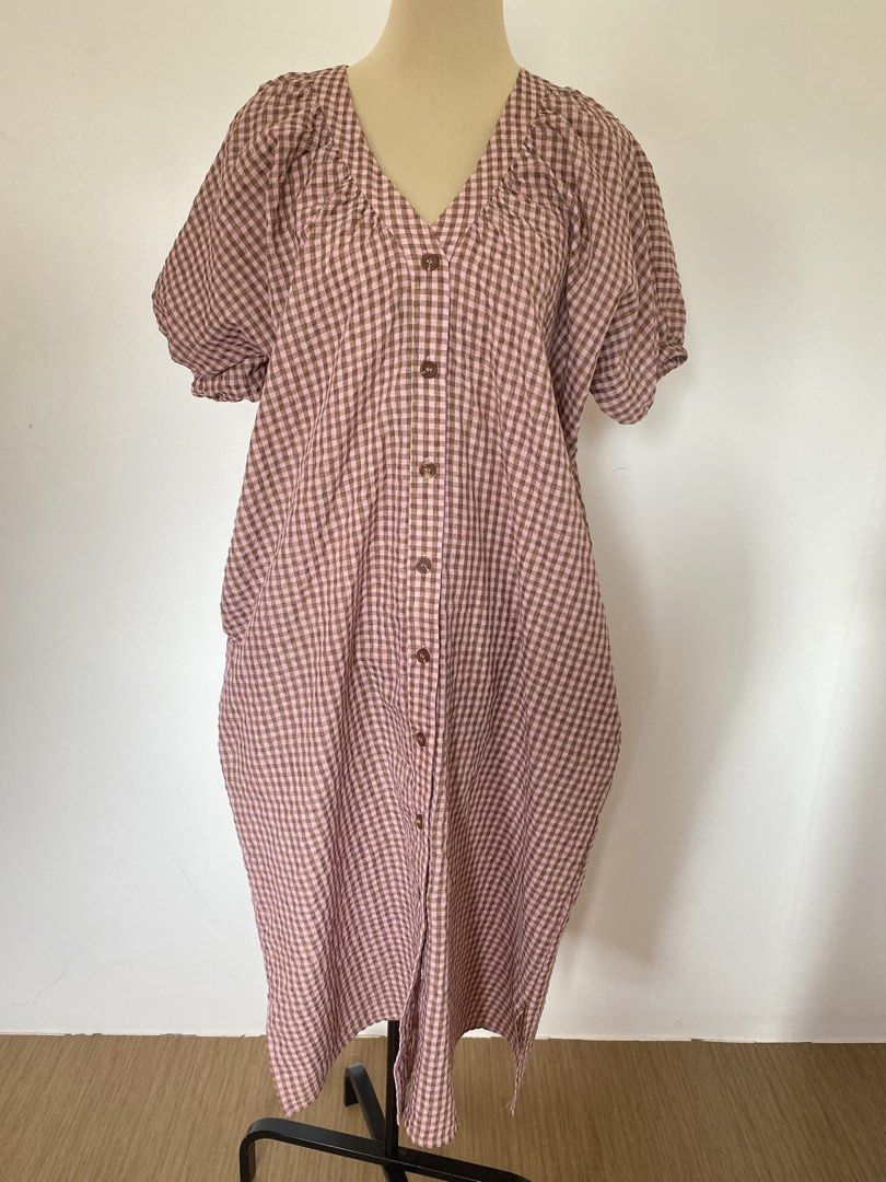Gingham Puff Sleeve Midi Dress with Buttons (Category: Dresses) located in Santa Rosa. Submitted by summerbrunch (Listing ID 1444861308, Image 1). Description: MANNEQUIN SIZE: Medium Can fit large- XL very nice when worn - Adorable pink and brown gingham pattern - Midi length with stylish puff sleeves - Functional button-up front - Convenient pockets included! - Ideal for casual outings and everyday wear.