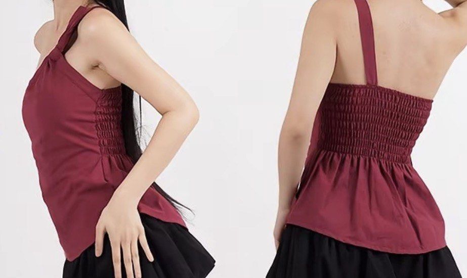 Girl Code One Shoulder Smocked Peplum Top (Category: Sleeveless) located in Manila. Submitted by ca.finds (Listing ID 1444966693, Image 2). Description: - Brand: Girl Code - Style: One-shoulder top - Features: Smocked bodice, peplum hem - Color: Deep red - Versatility: Dress up or down - Sizing: Refer to size chart for measurements.