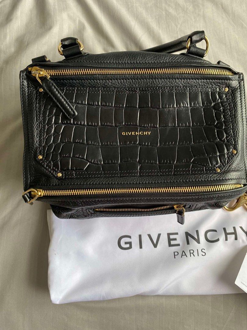 Givenchy Pandora Medium Croc Embossed Leather Bag Black (Category: Luxury Bags & Wallets) located in Quezon City. Submitted by cnalejandro (Listing ID 1444977077, Image 1). Description: - Authentic Black Givenchy Pandora Medium bag - Luxurious croc-embossed leather - Elegant gold hardware - Comes with dust bag, strap, and original receipt, care card and leather swatch - Ideal size for everyday essentials.