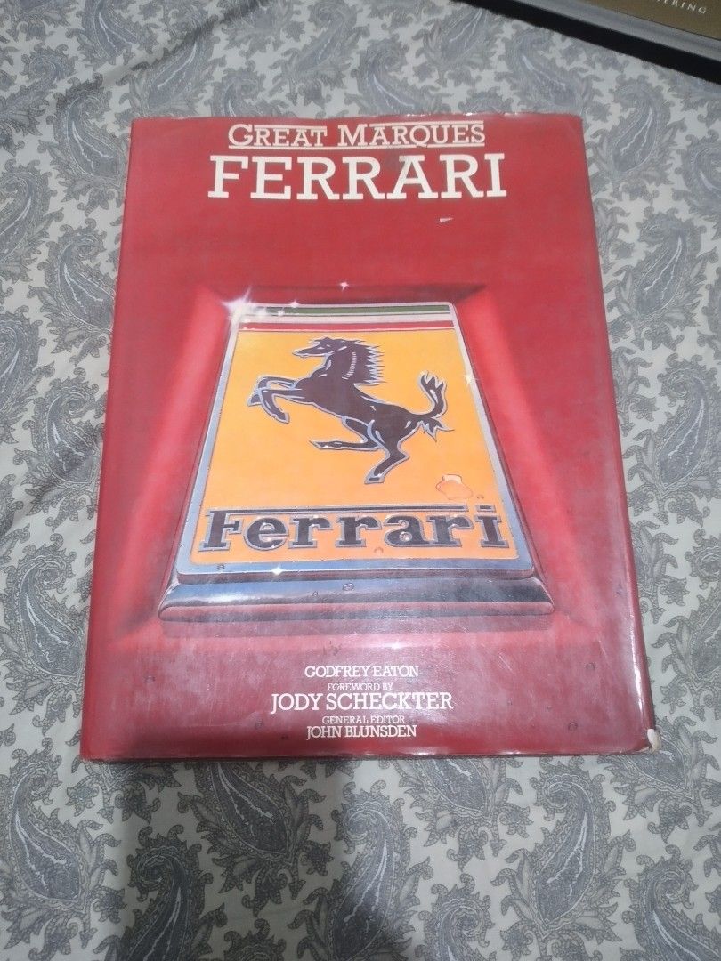 Great Marques Ferrari hardcover Book (Category: Storybooks) located in Pasig City. Submitted by aecollection03 (Listing ID 1444971870, Image 1). Description: - Ferrari book by Godfrey Eaton - Featuring Jody Scheckter and John Blunsden -Reprinted 1981 - Richly illustrated with photos of Ferrari engines and cars - A must-have for any Ferrari enthusiast - Hardcover -water Mark's on dustcover and first and last page shown on photos 2&4.