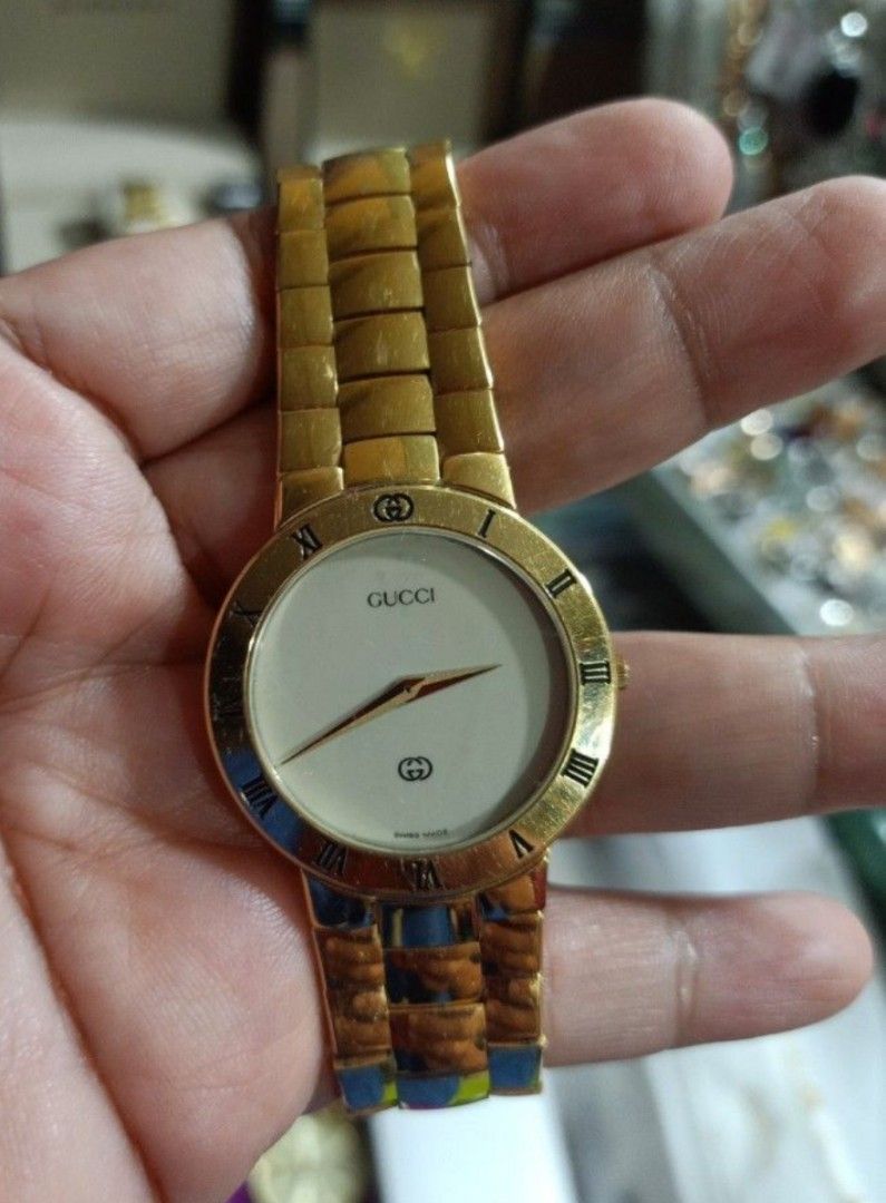 Gucci 3300 M Gold Plated Watch (Category: Women's Watches) located in Cagayan de Oro. Submitted by mmmdshop (Listing ID 1444863654, Image 1). Description: - Authentic Gold Plated Gucci Watch - Model: 3300 M - Features a classic white dial with elegant Roman numerals - Comfortable bracelet strap - Fully functional and working well well used expect sign of usage. .