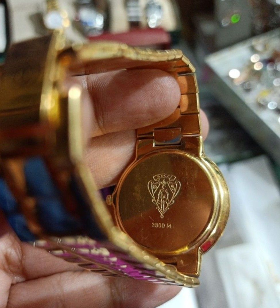 Gucci 3300 M Gold Plated Watch (Category: Women's Watches) located in Cagayan de Oro. Submitted by mmmdshop (Listing ID 1444863654, Image 2). Description: - Authentic Gold Plated Gucci Watch - Model: 3300 M - Features a classic white dial with elegant Roman numerals - Comfortable bracelet strap - Fully functional and working well well used expect sign of usage. .