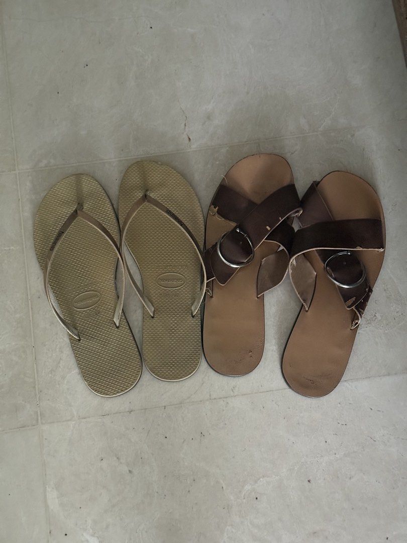 Havaianas Flip-flops and Brown Buckle Sandals (Category: Sandals) located in Singapore. Submitted by thewayiam (Listing ID 1444923230, Image 1). Description: - Gold Havaianas flip-flops - Brown leather sandals with buckle detail - Perfect for casual outings - Bundle price for both available.