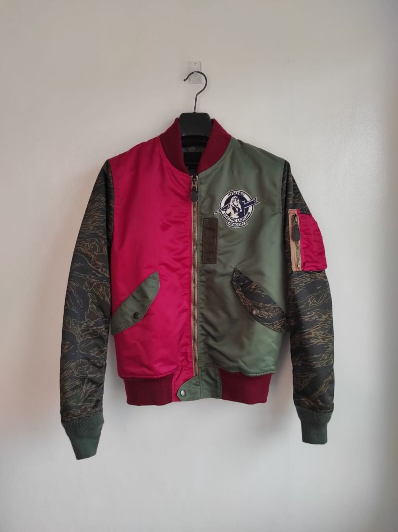 HYSTERIC GLAMOUR PrimaLoft Air Force Crazy Color L-2B Jacket (Category: Luxury Apparel) located in Pasay City. Submitted by highkeys (Listing ID 1445015638, Image 1). Description: - Hysteric Glamour bomber jacket - Size: Medium - Unique split design - Tiger camouflage sleeves - Patches on the chest - Ribbed cuffs and hem - Materials: Polyester, Wool, Nylon.
