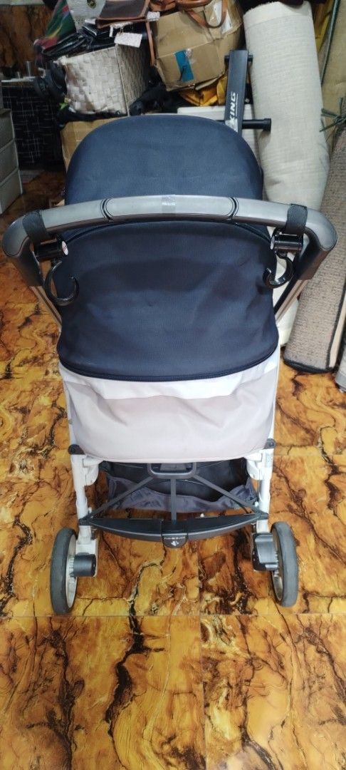 Inglesina Stroller (Category: Strollers) located in Caloocan City. Submitted by rowely_jpn (Listing ID 1444960987, Image 2). Description: Inglesina stroller. Beige and navy blue colorway. Has a 5-point harness for safety. Storage basket underneath. Easy to maneuver wheels. Folds for storage. Great for outings with your little one..