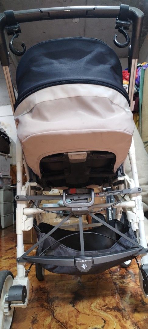 Inglesina Stroller (Category: Strollers) located in Caloocan City. Submitted by rowely_jpn (Listing ID 1444960987, Image 3). Description: Inglesina stroller. Beige and navy blue colorway. Has a 5-point harness for safety. Storage basket underneath. Easy to maneuver wheels. Folds for storage. Great for outings with your little one..