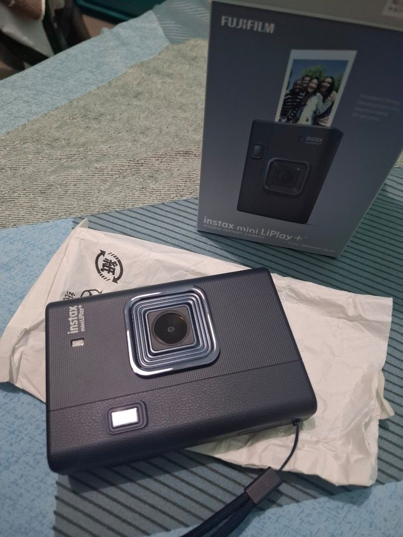 Instax Mini Liplay plus (Category: Cameras) located in Manila. Submitted by wildocean.0e5fd9 (Listing ID 1444986924, Image 2). Description: FS Instax mini Liplay plus midnight blue Freebies Clear hard case 5 films With receipt and original box Good condition No damage or scratches MOP: COP or COD Via: LBC Seller location: Ilocos Sur RFS planning to upgrade Pm for more pictures and information..