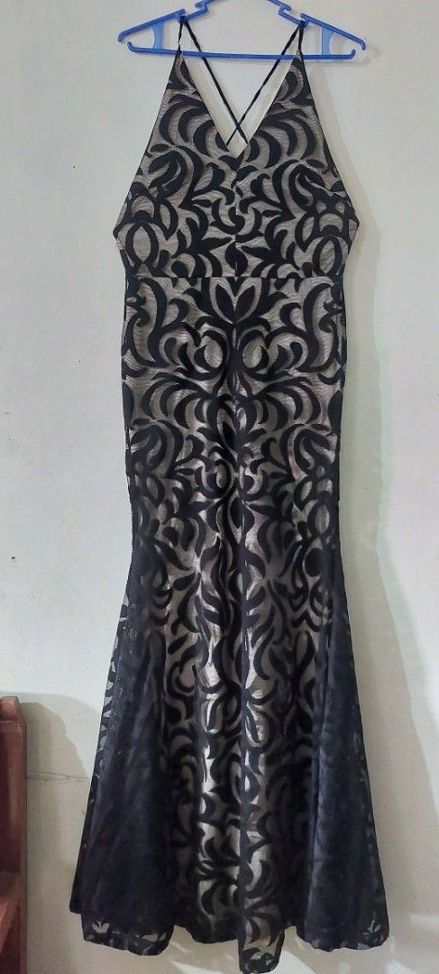 KARIMADON Black Lace Overlay Evening Gown (Category: Evening dresses & gowns) located in Manila. Submitted by happytree.1e62c1 (Listing ID 1444923359, Image 1). Description: - Stunning black evening gown - Features an intricate lace overlay - Flattering V-neckline - Chic criss-cross straps at the back - Slightly flared hem for a graceful silhouette - Ideal for formal events, parties, or special occasions - From the reputable brand KARIMADON (esta