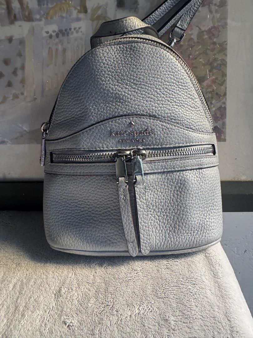 Kate Spade New York Pebble Leather Backpack (Category: Luxury Bags & Wallets) located in Paranaque City. Submitted by msjam63 (Listing ID 1444952465, Image 1). Description: - Light blue Kate Spade mini backpack -Detachable straps for sling,shoulder or backpack - Genuine pebble leather - Silver hardware with zip closures - Adjustable straps - Small interior - Ideal for everyday use -Brought from Canada.