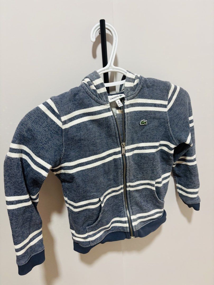 Lacoste Jacket with Hood (Category: Babies & Kids Fashion) located in Batangas. Submitted by aveena0413 (Listing ID 1444964090, Image 2). Description: Lacoste Jacket with Hood (Pre-loved) * Size: 8 * Fits: 4–5 years old * Measurement: 128 cm / 51 inches * Condition: Used but not abused (well cared for).