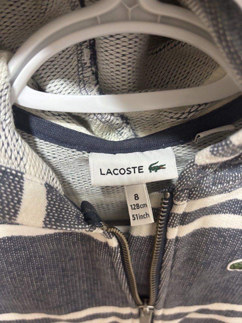 Lacoste Jacket with Hood (Category: Babies & Kids Fashion) located in Batangas. Submitted by aveena0413 (Listing ID 1444964090, Image 3). Description: Lacoste Jacket with Hood (Pre-loved) * Size: 8 * Fits: 4–5 years old * Measurement: 128 cm / 51 inches * Condition: Used but not abused (well cared for).