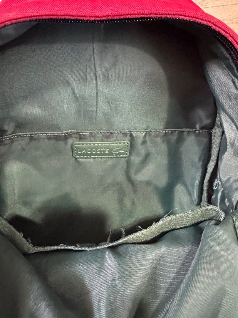 Lacoste Small Neocroc Canvas Backpack (Category: Backpacks) located in Quezon City. Submitted by turak2020plus1 (Listing ID 1444900683, Image 3). Description: Lacoste Neocroc Small Backpack Exterior: one zip pocket. Interior: three pockets Adjustable straps Embroidered green crocodile branding Dimensions 25 x 34 x 10.5 cm Polyester exterior.