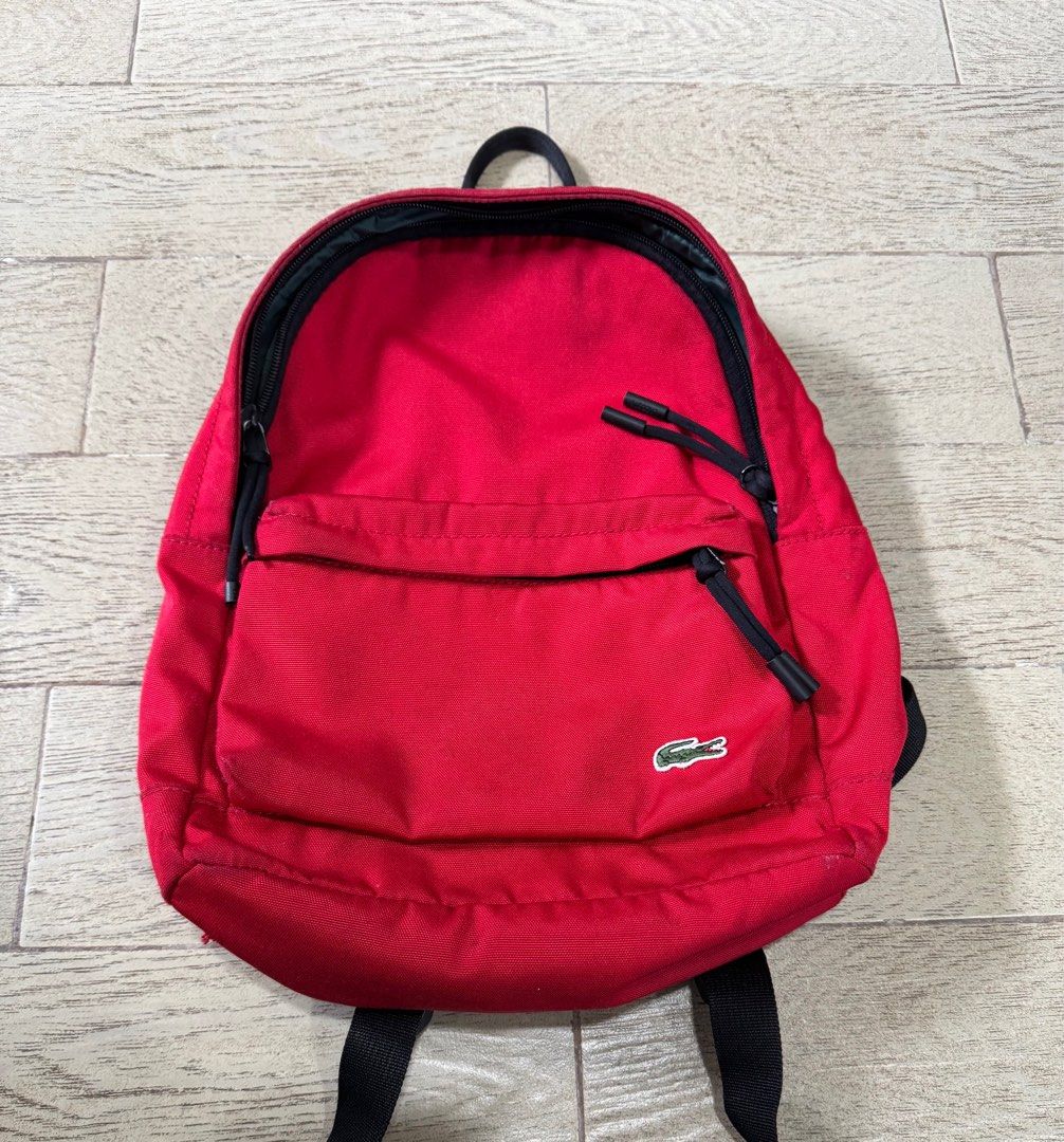 Lacoste Small Neocroc Canvas Backpack (Category: Backpacks) located in Quezon City. Submitted by turak2020plus1 (Listing ID 1444900683, Image 1). Description: Lacoste Neocroc Small Backpack Exterior: one zip pocket. Interior: three pockets Adjustable straps Embroidered green crocodile branding Dimensions 25 x 34 x 10.5 cm Polyester exterior.