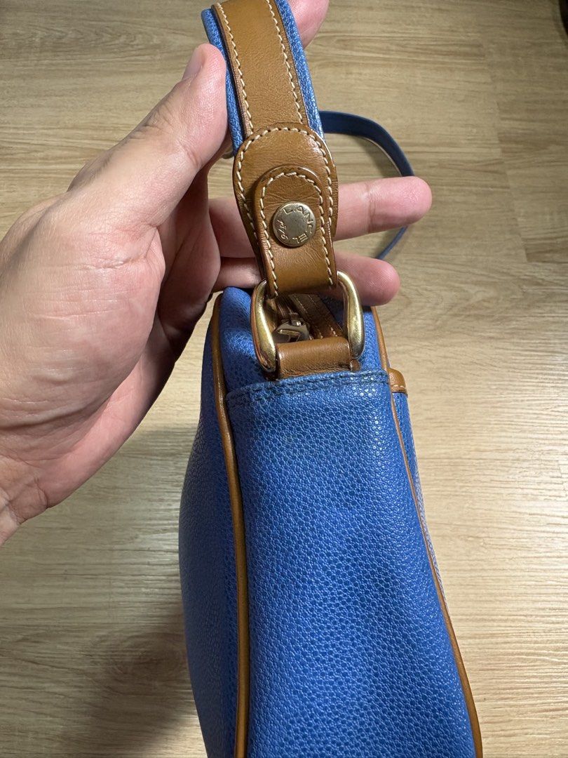 Lancel (Category: Luxury Bags & Wallets) located in Bulacan. Submitted by rsl2025 (Listing ID 1444926294, Image 3). Description: 🔰Vintage Lancel Paris Blue Leather Bag with Tan-Colored Crest Emblem on the Front 🔰 Made in Italy 🇮🇹 .