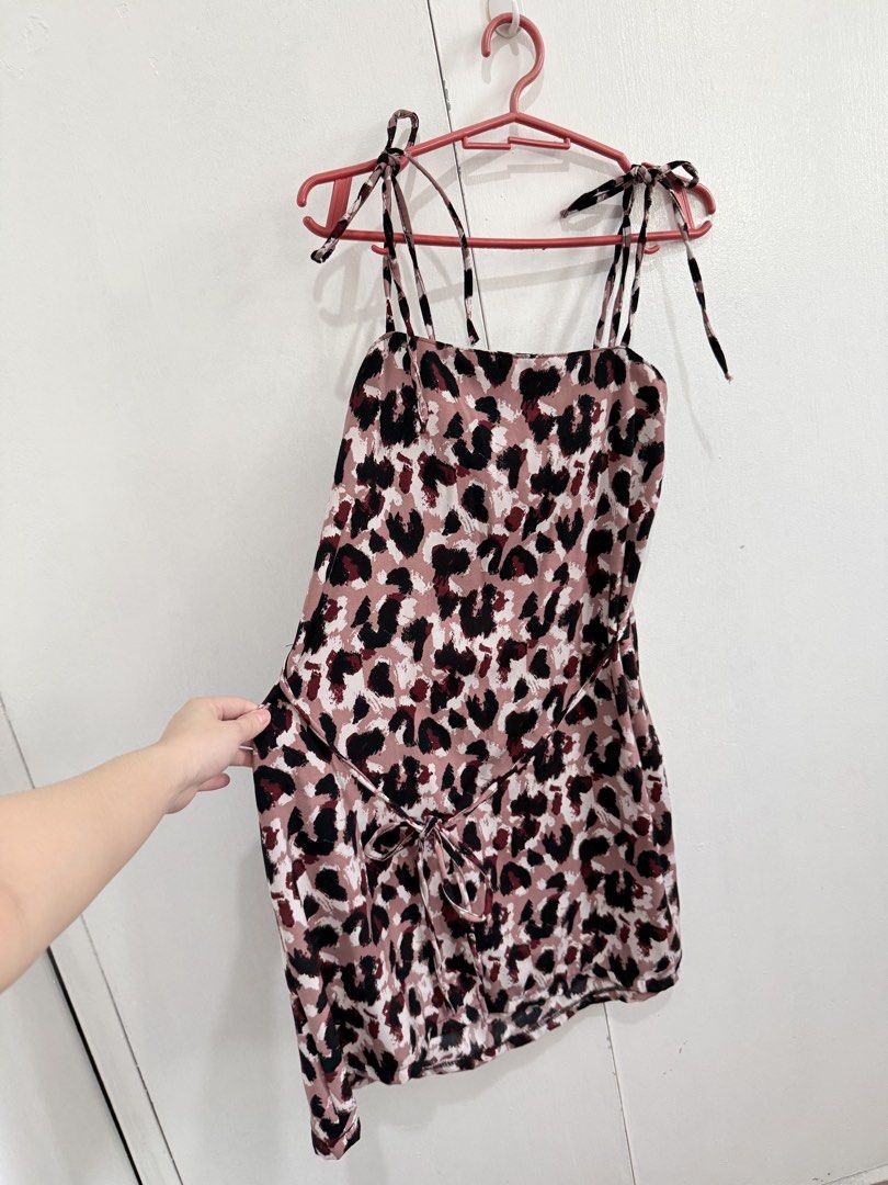 Leopard Print Slip Dress with Tie Straps (Category: Dresses) located in Quezon City. Submitted by annescloset10 (Listing ID 1444970460, Image 3). Description: - Adorable slip dress with a fun leopard print. - Features adjustable tie straps for a customized fit. - Includes a waist tie detail to cinch and flatter your figure. - Versatile for casual outings or evening events. - Effortless to style for any occasion..