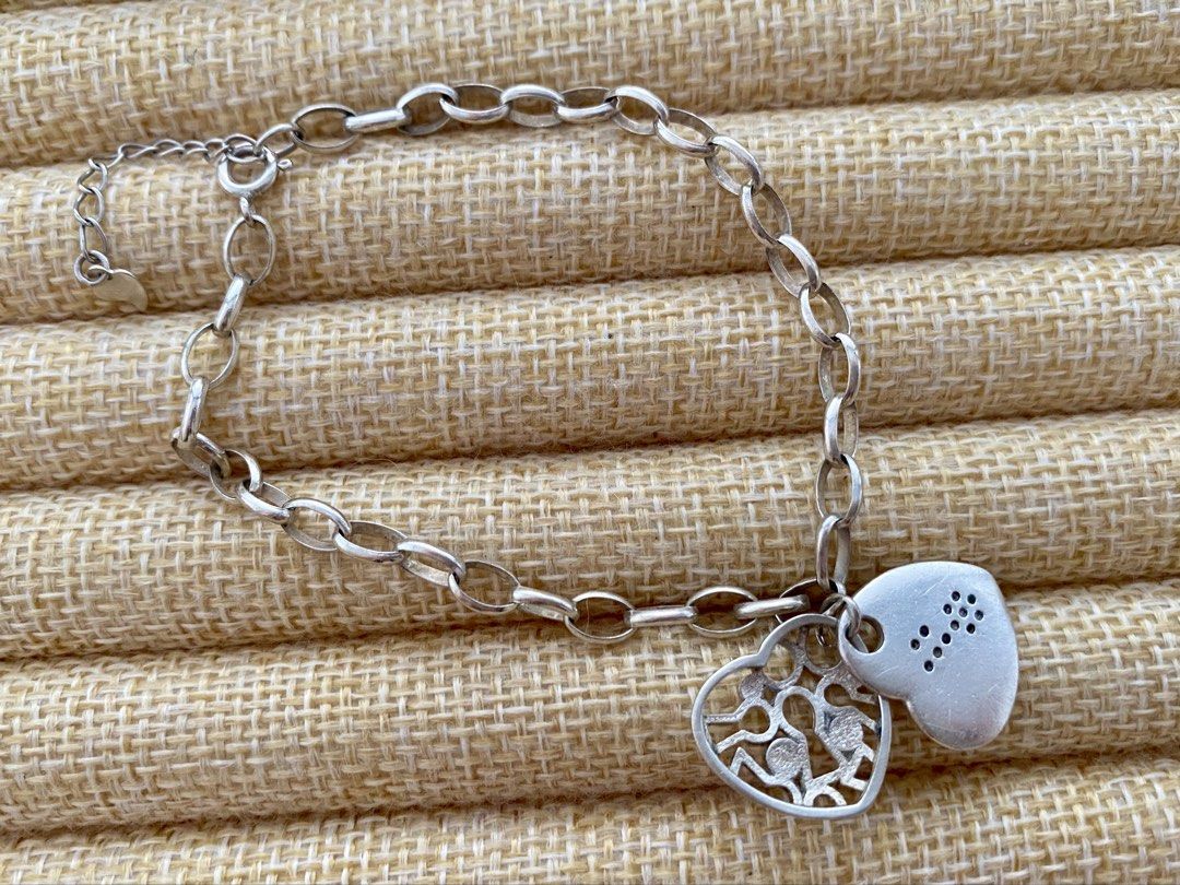 Link chain charm bracelet featuring two heart pendants | S925 (Category: Bracelets) located in Solano. Submitted by silvershineph (Listing ID 1444910332, Image 2). Description: Silver link chain charm bracelet featuring two heart pendants Size: 9” Weight: 8.7.