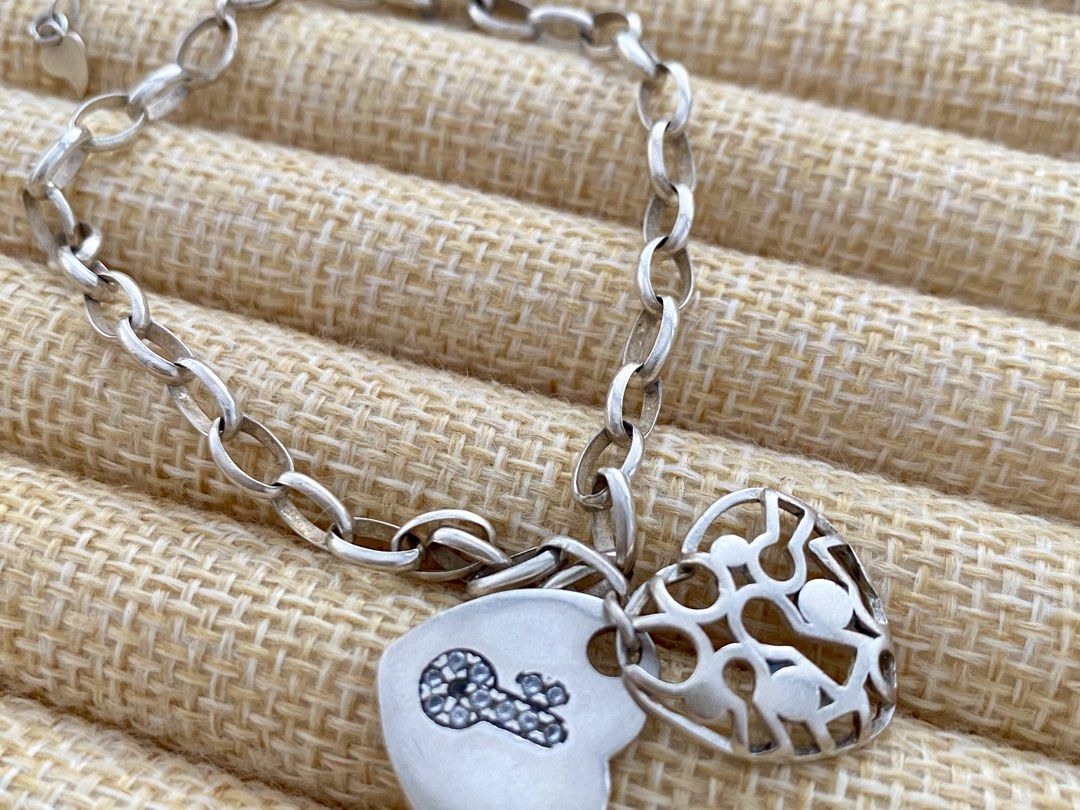 Link chain charm bracelet featuring two heart pendants | S925 (Category: Bracelets) located in Solano. Submitted by silvershineph (Listing ID 1444910332, Image 3). Description: Silver link chain charm bracelet featuring two heart pendants Size: 9” Weight: 8.7.