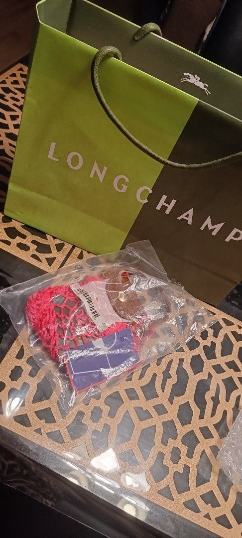 Longchamp Le Pliage Filet XS (Category: Luxury Bags & Wallets) located in Cavite. Submitted by mvalegre (Listing ID 1444906758, Image 2). Description: - Selling super low. - Authentic Longchamp Filet XS - hot pick - Secure gold button closure - Comes complete. 💯 authentic .