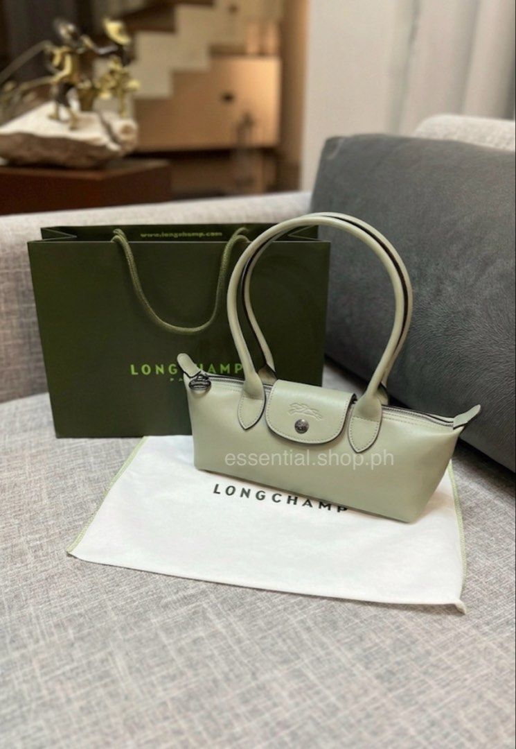 Longchamp Le Pliage Xtra Shoulder Bag Tundra (Category: Shoulder Bags) located in Manila. Submitted by essential.shop.ph (Listing ID 1444899091, Image 1). Description: FOR PRE-ORDER. 1-2weeks ETA ACTUAL PICTURES POSTED Authentic Longchamp Le Pliage Xtra M Shoulder Bag Tundra Reference: 10370987555 Dimensions: 10.2 in (L - measured at the base of the bag) x 4.3 in (H) x 3.3 in (W) Material: Cowhide leather Metallic Hardware: Dark silver color Incl