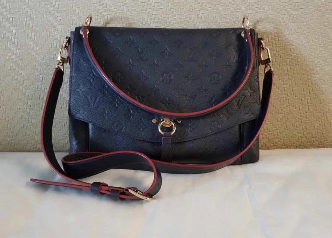 Louis Vuitton Monogram Empreinte Artsy MM Bag (Category: Luxury Bags & Wallets) located in Manila. Submitted by romson28 (Listing ID 1444907808, Image 1). Description: LV Blanche Empriente Condition: 9.5 Comes with receipt and Dust-bag (bought in Paris 2018 Can provide more images if you have any inquiries:>.
