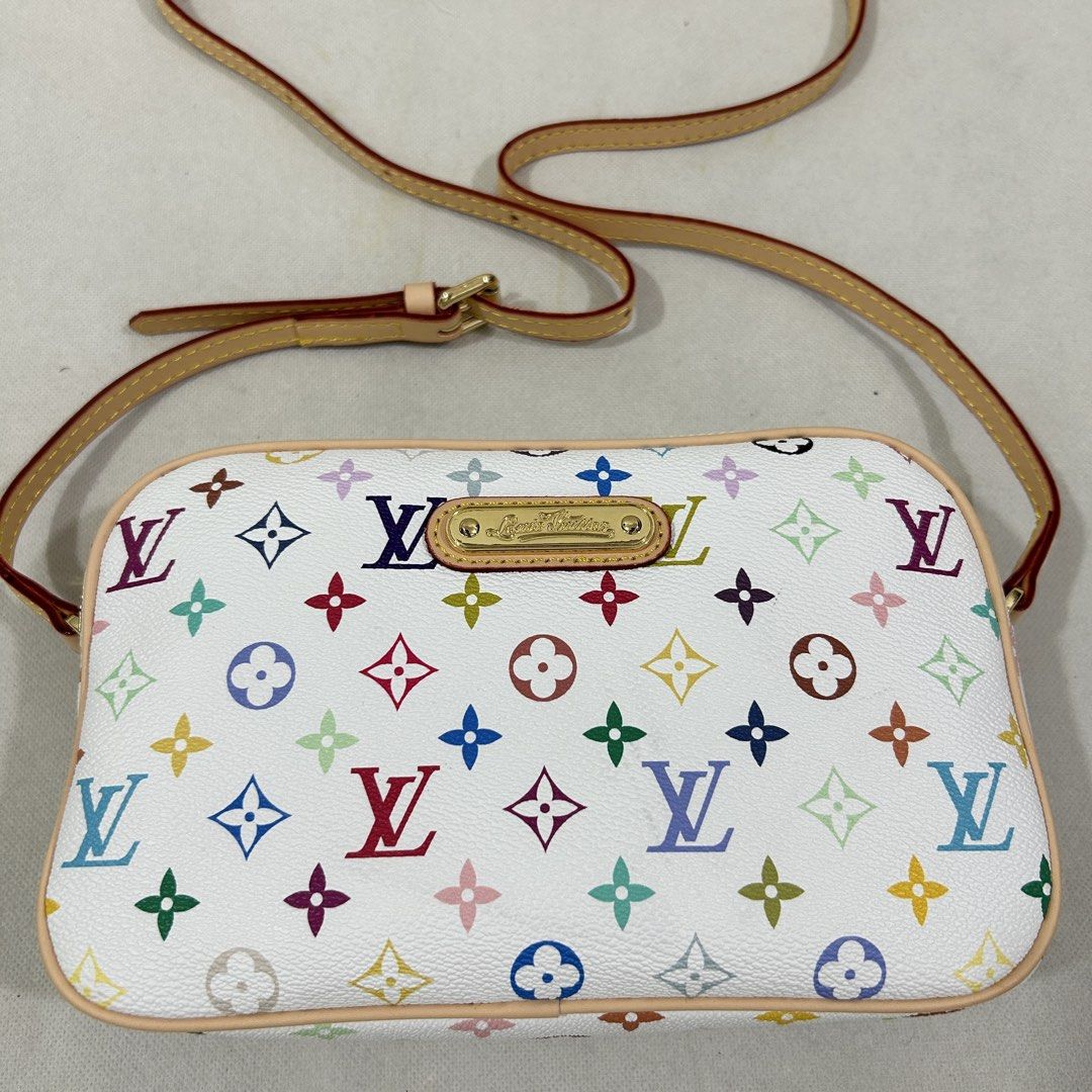 Louis Vuitton Multicolor Monogram Canvas Pochette Accessoire Bag (Category: Luxury Bags & Wallets) located in Cavite. Submitted by moo2k (Listing ID 1444891915, Image 2). Description: - Authentic Louis Vuitton Pochette Accessoire - Iconic multicolor monogram on white canvas - Gold-tone hardware with engraved zippers - Leather trim and adjustable strap - Perfect for carrying essentials - Made in France.