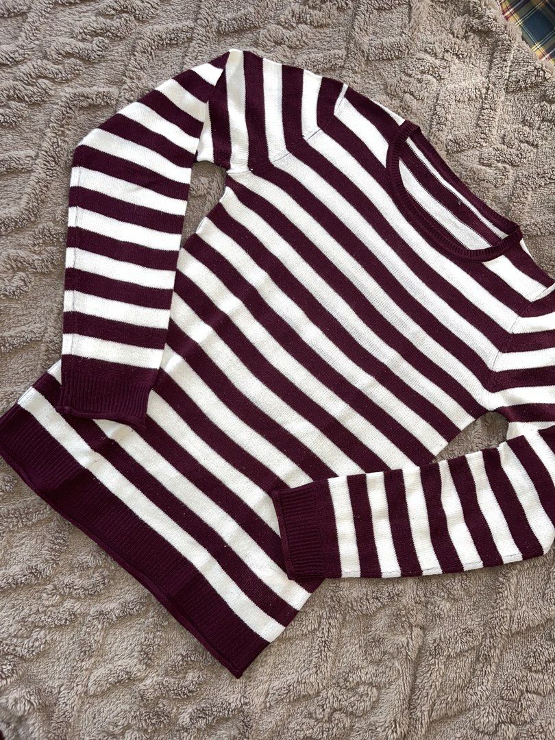 Maroon and White Striped Long Sleeve Sweater (Category: Longsleeves) located in Bangui. Submitted by dearrue (Listing ID 1444889191, Image 1). Description: - Classic maroon and white striped design - Long sleeves with ribbed cuffs and hem - Comfortable crew neck - Made from soft, cozy knit fabric - Versatile for layering or standalone wear - Easily pairs with jeans, skirts, or other bottoms - Lightly sheer.