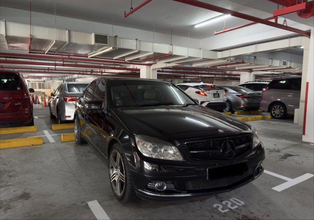 Mercedes-Benz C-Class Saloon C180K Auto (Category: Used Cars) located in Singapore. Submitted by lighthouses (Listing ID 1444915817, Image 2). Description: Black Mercedes-Benz C-Class sedan. Clean exterior. Alloy wheels. Tinted windows. Ready for a new owner. Drives smoothly. Great for daily commutes or longer trips. Contact me for more details..