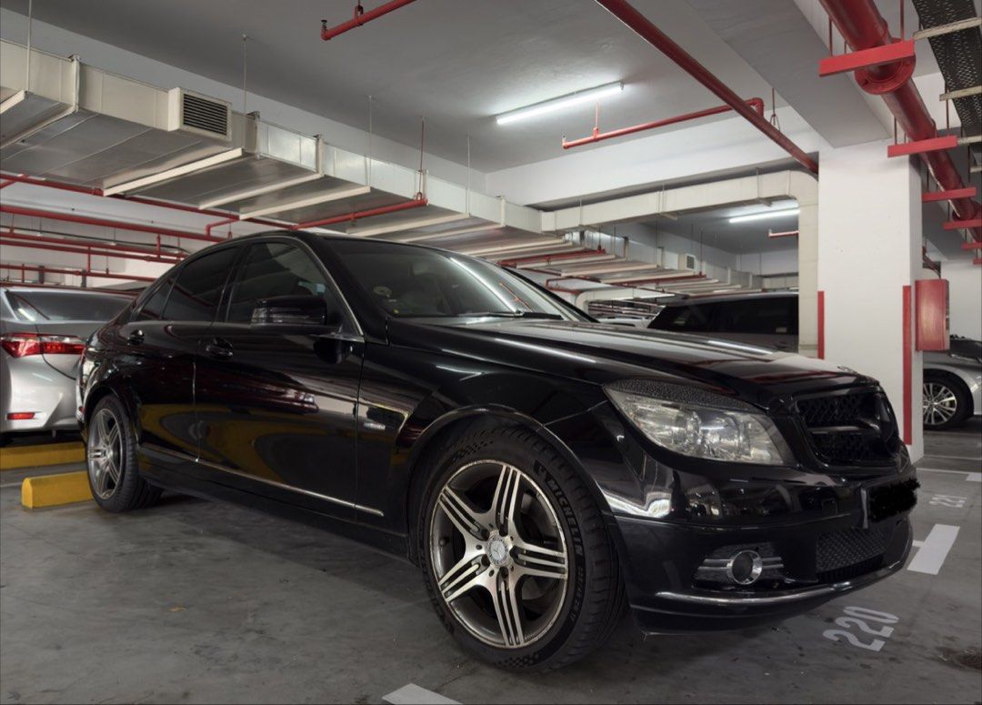 Mercedes-Benz C-Class Saloon C180K Auto (Category: Used Cars) located in Singapore. Submitted by lighthouses (Listing ID 1444915817, Image 3). Description: Black Mercedes-Benz C-Class sedan. Clean exterior. Alloy wheels. Tinted windows. Ready for a new owner. Drives smoothly. Great for daily commutes or longer trips. Contact me for more details..