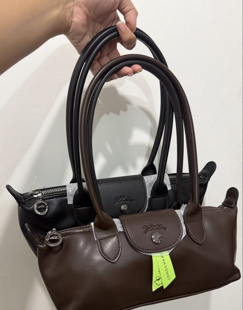 Mocha Brown Ebony Shoulder Bag Longchamp Leather (Category: Shoulder Bags) located in Manila. Submitted by _girlfinds (Listing ID 1443914191, Image 3). Description: 👜 LONGCHAMP LE PLIAGE XTRA – M SHOULDER BAG Black | Elegant & Versatile Effortlessly sophisticated, the Longchamp Le Pliage Xtra M Shoulder Bag combines timeless style with everyday functionality. Designed with a sleek silhouette and premium finish, it's the perfect companion for wor