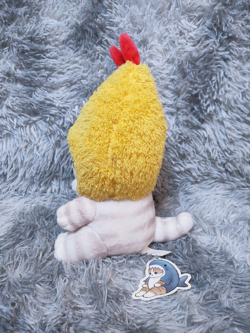 Mofusand Fried Shrimp Cat Plushie (Category: Plushies & Soft Toys) located in Antipolo. Submitted by bhabiegraciefashionlab (Listing ID 1444877804, Image 2). Description: This mofusand plush toy is the "Fried Shrimp Cat" character, featuring a soft, white feline plushie dressed in a yellow, textured shrimp costume with a red accent on top #mofusand.
